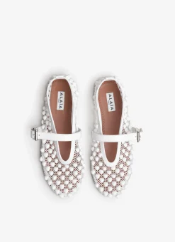 BALLET FLATS WITH STUDS ON FISHNET