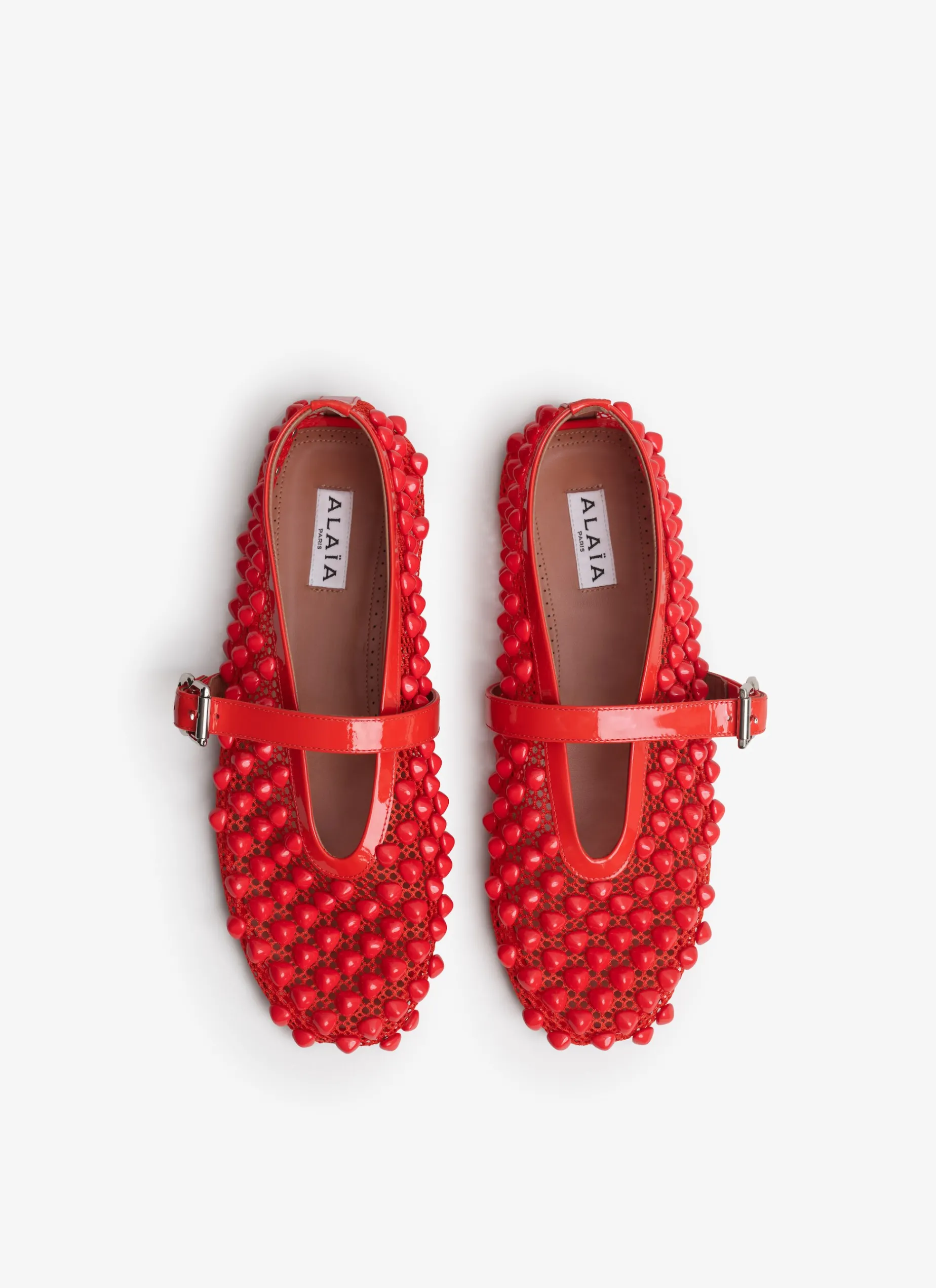 BALLET FLATS WITH STUDS ON FISHNET