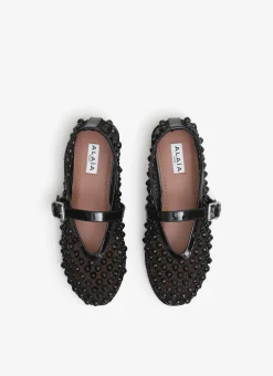 BALLET FLATS WITH STUDS ON FISHNET