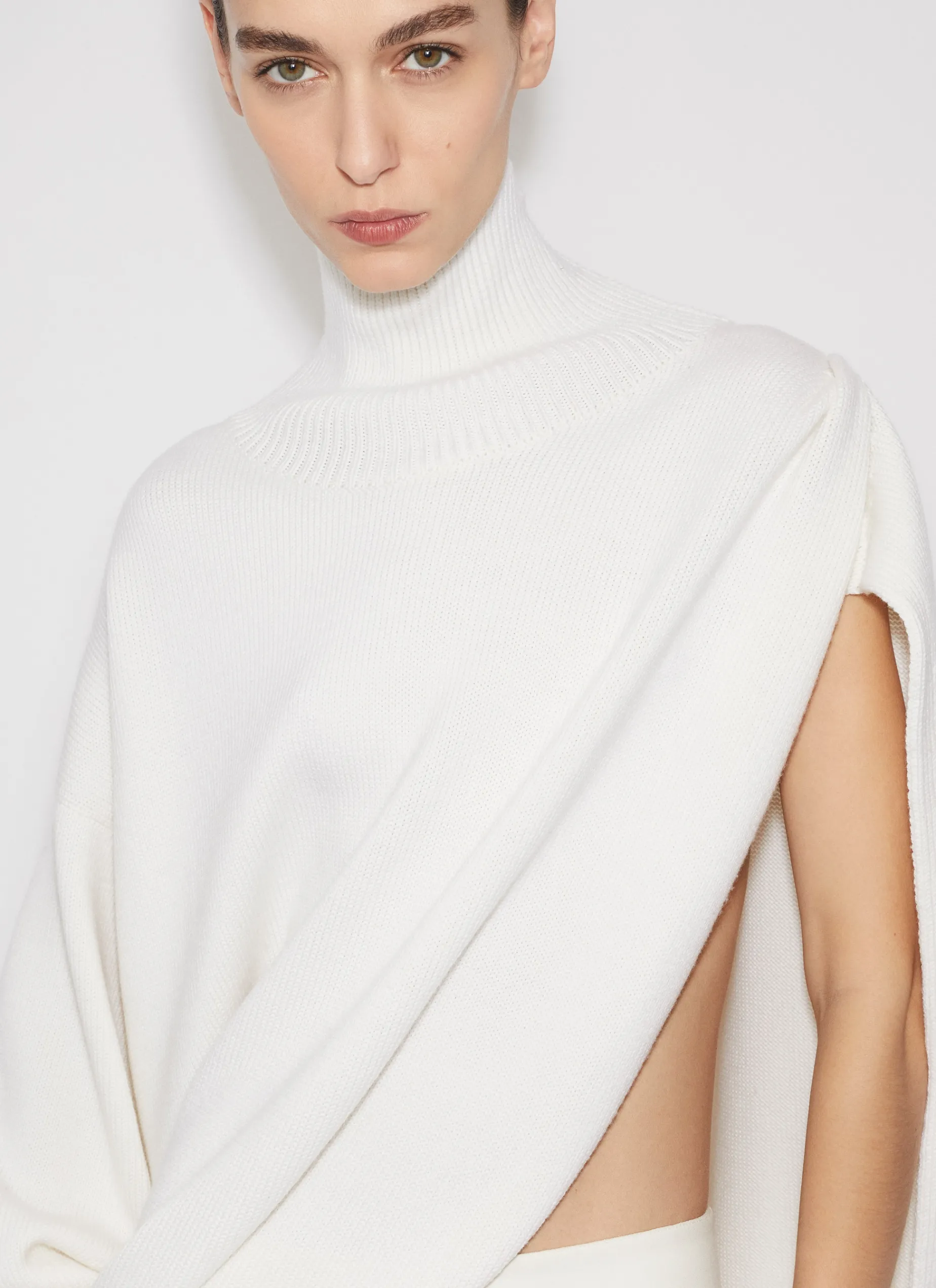 KNITTED ASYMMETRICAL CAPE JUMPER