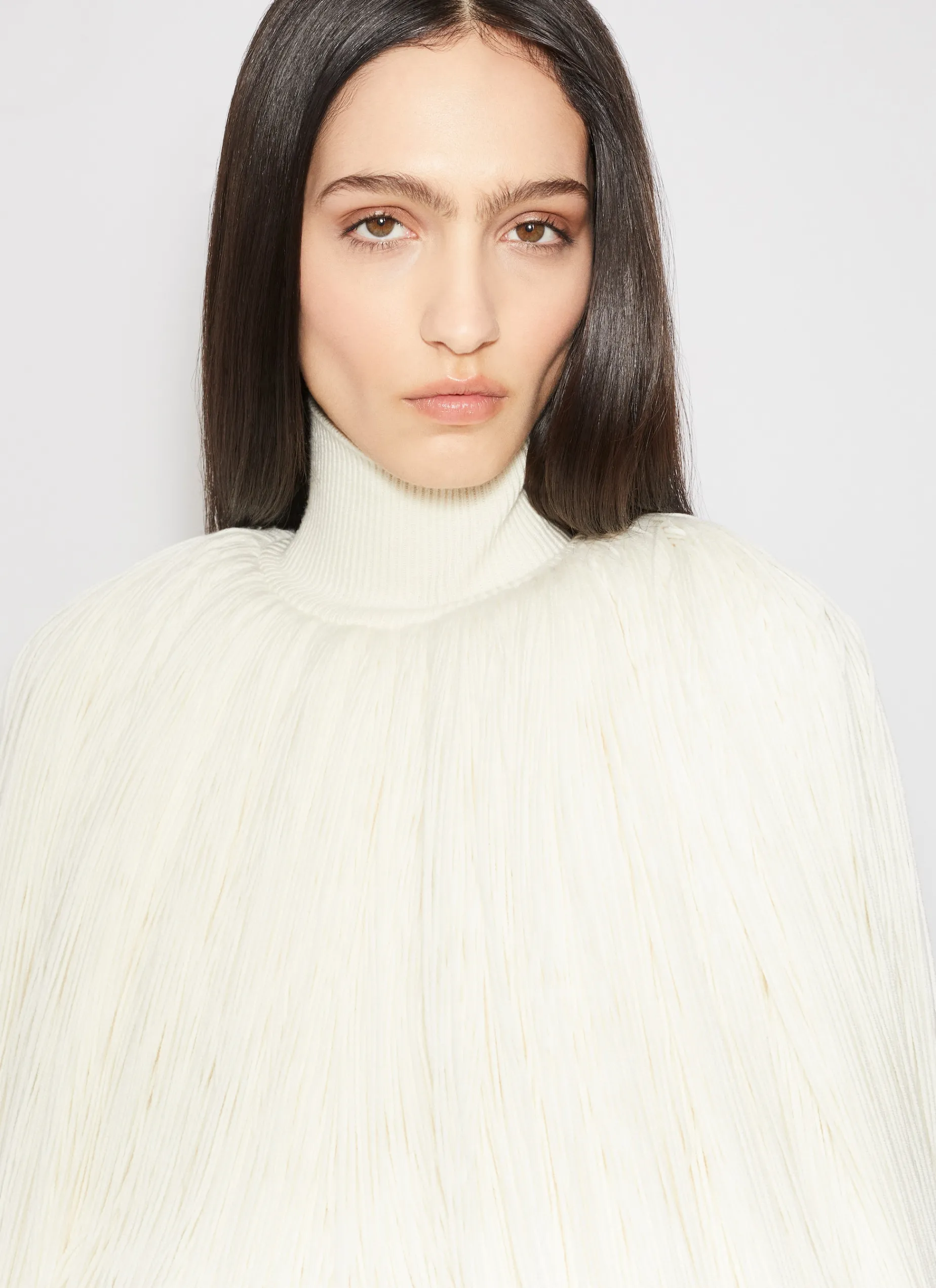 KNITTED FRINGES JUMPER