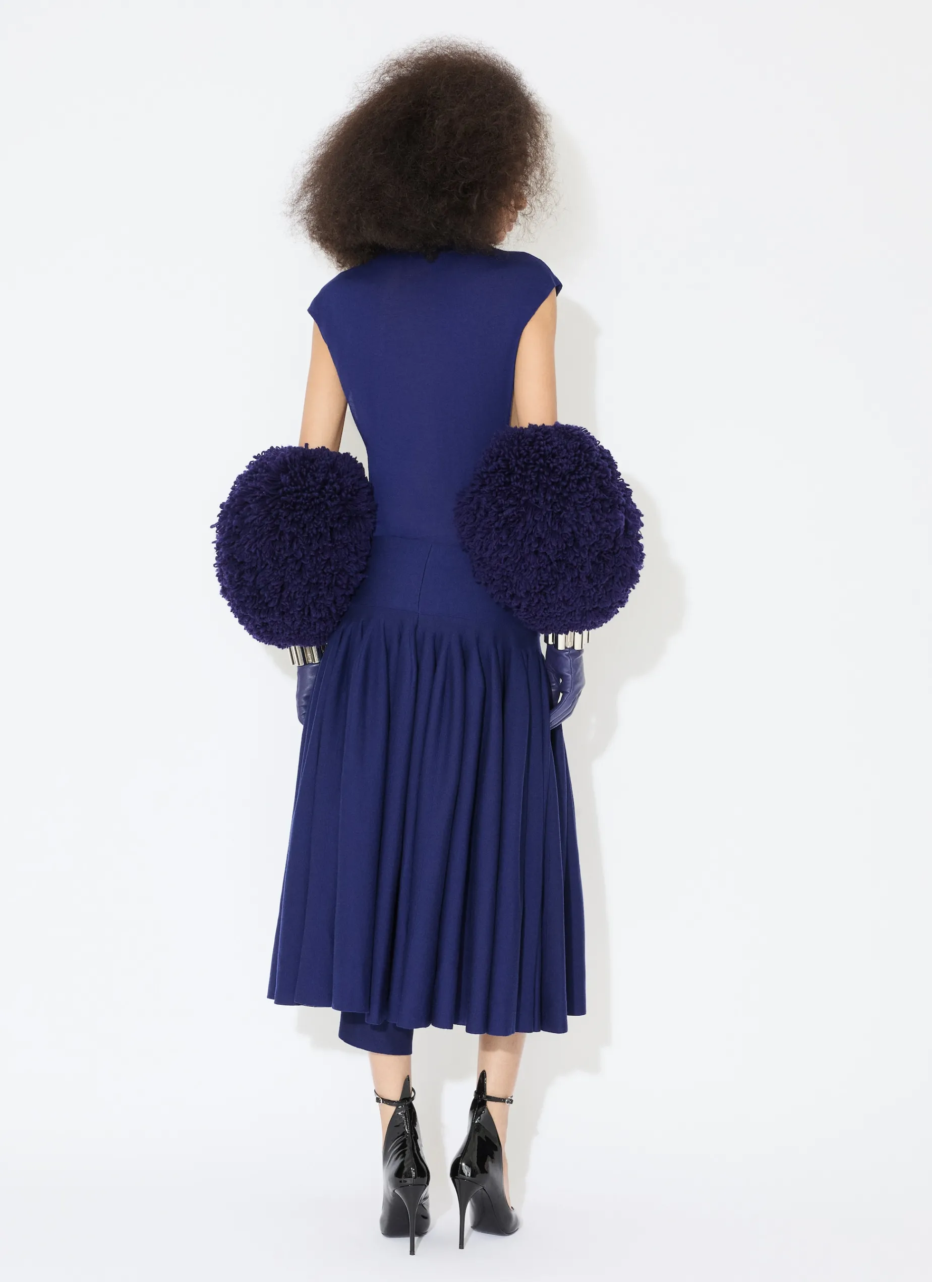 PLEATED SKIRT IN TIGHT GODET KNIT