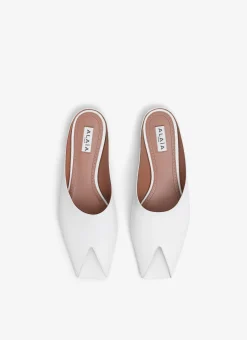 SPIKE FLAT MULES IN CALFSKIN